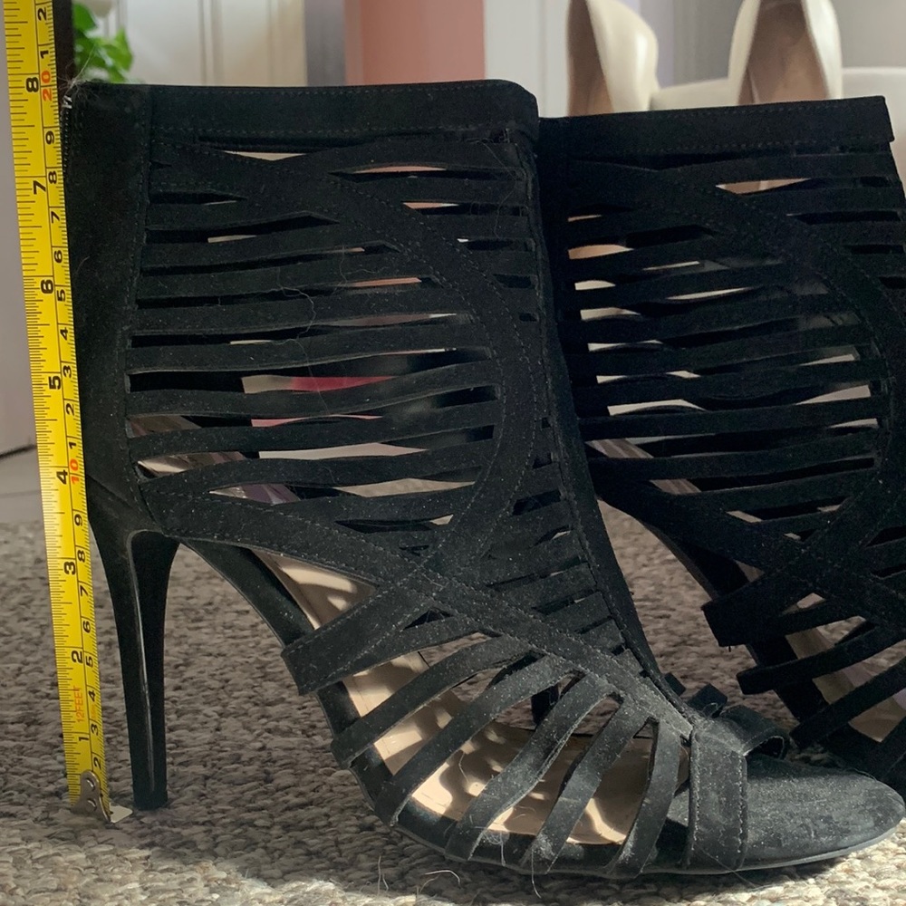 Black strappy zip up bootie heels